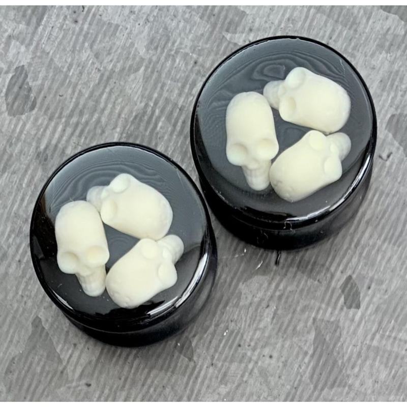 PAIR of Unique Triple Skull Encased Black Acrylic Saddle Plugs  - Gauges 00g (10mm) thru 15 16