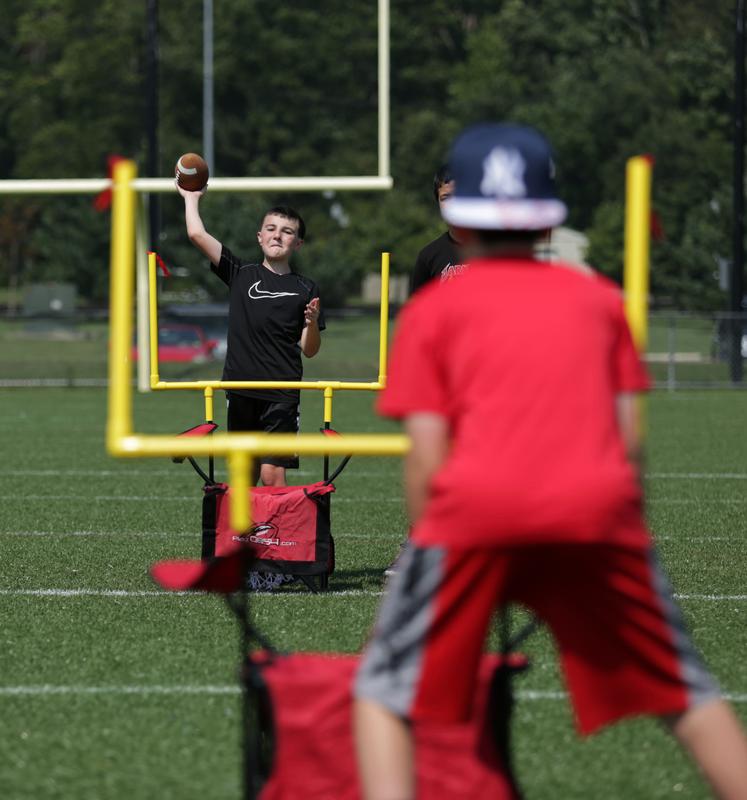 QB54 Black Set - 2 Chairs, 2 Sets of Goalposts, 1 football, 1 carrying bag, 1 kicking tee, 1 ball pump